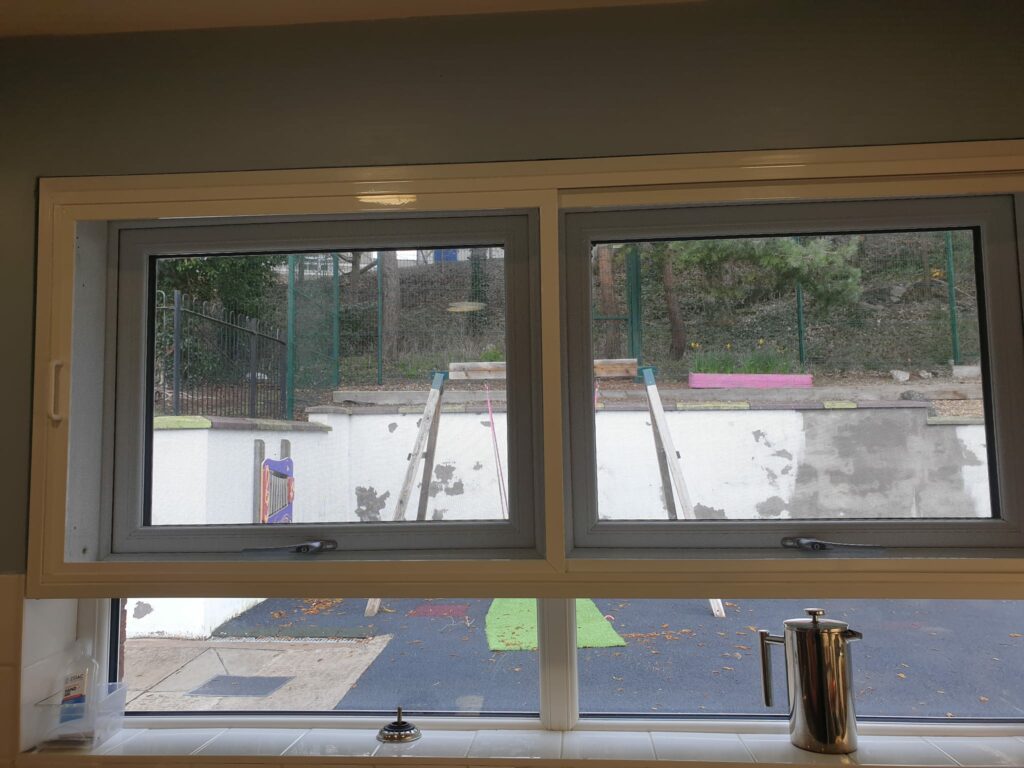 Sliding fly screens for windows at schools